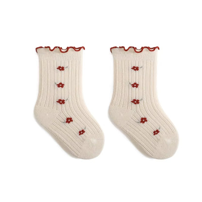 Babystrumpor med Volangkant