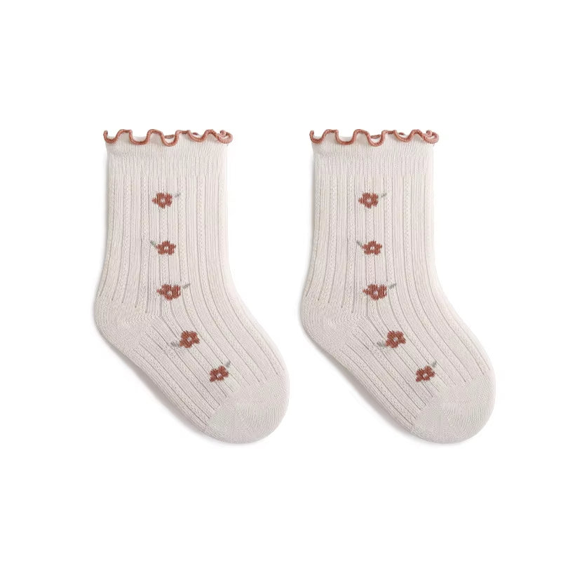 Babystrumpor med Volangkant