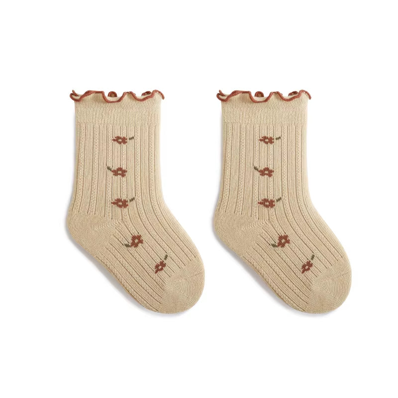 Babystrumpor med Volangkant